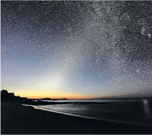  ??  ?? It’s back...the zodiacal light and thanks to Barry Burgess, we all get to see it! This amazing photo was taken in Guysboroug­h, N.S., - in the Tor Bay Provincial park - at 5:02 a.m., Sept 14.