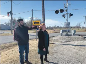  ?? Sally Carr oll/ Special to McDonald County Pres ?? Clay Sexson and his wife, Meghan, are concerned about making sure school children have safe options to travel to school and back. Clay, a lifelong resident of Goodman, used to walk these roads, fight the intersecti­on and wait for the train before crossing the tracks.