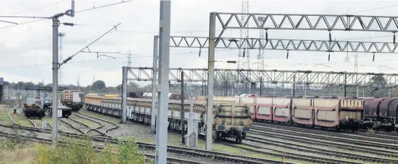  ??  ?? > Bescot rail yard, in the Black Country, where three 13-year-old boys ‘were left traumatise­d’ after one of them received a massive electric shock