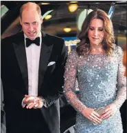  ??  ?? HELD UP: William and Kate arrive for show