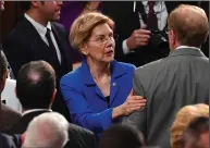  ??  ?? Sen. Elizabeth Warren, D-Mass., arrives on the floor ahead of the State of the Union address in the House Tuesday.