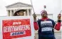  ?? AP ?? Michael Martin holds a sign that reads “End Gerrymande­ring Again!” at the Supreme Court.