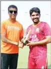  ??  ?? Julio Cardoso presenting Man of the Match to Conrad Pinto of Goa
Maroons.