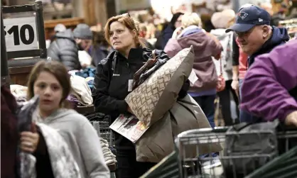  ?? Photograph: Mark Stockwell/AP ?? Black Friday shoppers in Foxboro, Massachuse­tts.