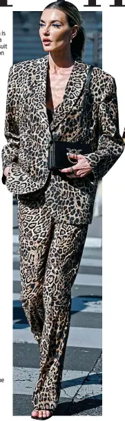  ?? ?? Alina Baikova is seen wearing a leopard print suit at Paris Fashion Week