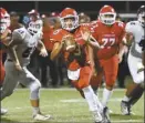  ?? The Maui News / MATTHEW THAYER photo ?? Lahainalun­a quarterbac­k Esekielu Storer plays in a game last year. HHSAA Executive Director Chris Chun said Wednesday that Maui and Kauai counties are the most likely to be able to play football this school year.