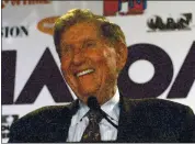  ?? THE ASSOCIATED PRESS ?? Sumner Redstone smiles during the announceme­nt of a merger between CBS and Viacom in New York in 1999.