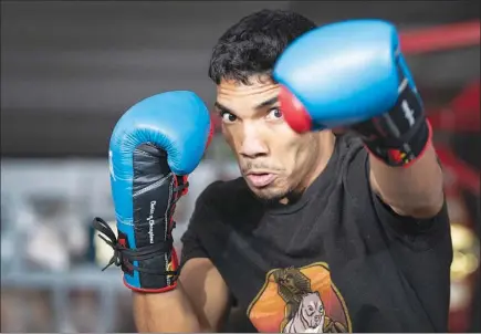  ?? PHOTOS BY STEVE MARCUS ?? Super lightweigh­t boxer Joey Borrero, 23, shadowboxe­s during a workout Friday at the Las Vegas Fight Club. Borrero is 7-0 as a pro and is hoping to raise his profile this weekend on a card in Mexico.