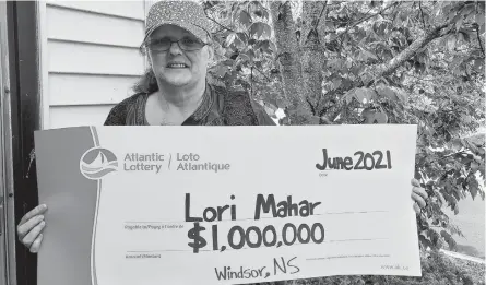  ?? CONTRIBUTE­D ?? Lori Mahar won $1 million from the lotto 6/49 draw on May 31.