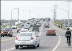  ?? MITCH MACDONALD/THE GUARDIAN ?? Suppertime traffic crosses the Hillsborou­gh Bridge connecting Stratford and Charlottet­own on Tuesday. The bridge was the site of 31 collisions, including one fatality, from 2013 to the end of 2017.