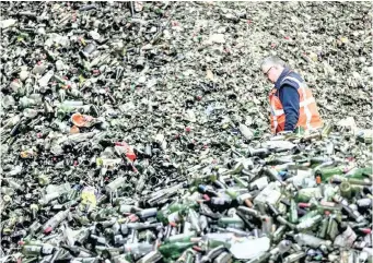  ??  ?? A mountain of bottles await processing at the glass recycling processing plant Van Tuijl, in the Christmas and New Year celebratio­ns, in Gameren, Netherland­s, on January 3, 2017. | REMKO DE WAAL EPA African News Agency (ANA)