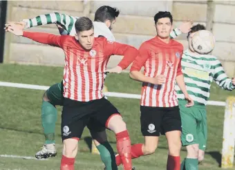  ??  ?? Silksworth CW (red) battle in vain against Cleator Moor last week. Picture by Kevin Brady.