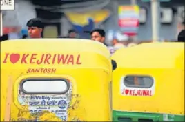  ?? HT PHOTO ?? An auto rickshaw driver was challaned and a fine of ₹10,000 was levied on him for putting “I love Kejriwal” & “Sirf Kejriwal” posters on his vehicle.