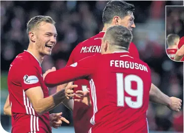 ??  ?? Aberdeen’s Ryan Hedges celebrates his goal to make it 2-1 with team-mate Lewis Ferguson