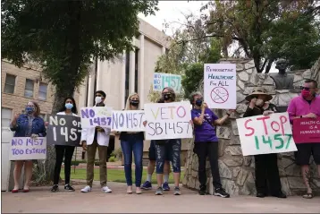  ?? ROSS D. FRANKLIN — THE ASSOCIATED PRESS FILE ?? People protest an abortion bill at the Arizona Capitol in Phoenix.