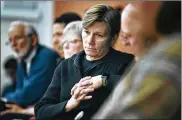  ?? ANGELA WILHELM / AP ?? Asheville Police Chief Tammy Hooper listens to residents and others during a community meeting Wednesday. Hooper offered to resign after video of Johnnie Rush’s violent arrest from August surfaced.