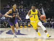  ?? Marcio Jose Sanchez / Associated Press ?? Cal’s Darius McNeill (1), shown against Cal State Fullerton in December, is showing signs of pulling out of his January funk.