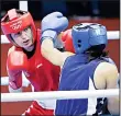  ??  ?? In this Aug 8, 2012 file photo, Ireland’s Katie Taylor (left), fights Tajikistan’s Mavzuna Chorieva in a lightweigh­t 60kg semifinal boxing match at the 2012
Summer Olympics, in London. (AFP)