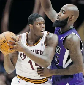  ?? MARK DUNCAN/The Associated Press ?? Canadian-born Anthony Bennett, left, of the Cleveland Cavaliers, battles Sacramento Kings defender Quincy Acy during first-half NBA action in Cleveland. Bennett, the only Canadian
taken first overall in the NBA draft, has had an up-and-down start to...