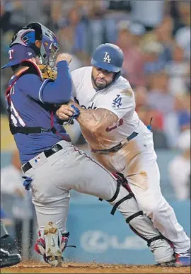  ?? Jae C. Hong Associated Press ?? EN ROUTE to his first All-Star game appearance since 2012, Matt Kemp ran into Texas Rangers catcher Robinson Chirinos last month at Dodger Stadium.