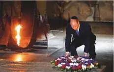  ?? Reuters ?? Prince William lays a wreath during a ceremony commemorat­ing the six million Jews killed by the Nazis.