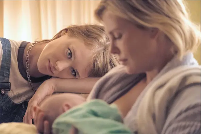  ??  ?? Mackenzie Davis, left, and Charlize Theron in a scene from “Tully.”