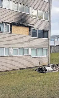  ??  ?? Fire damage The heat of the flames smashed the windows in the first floor flat