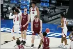  ?? DARRON CUMMINGS — THE ASSOCIATED PRESS ?? Colgate’s Jeff Woodward (55) reacts after hitting a shot and getting fouled during the second half of a first round game against Arkansas at Bankers Life Fieldhouse in the NCAA men’s college basketball tournament, Friday in Indianapol­is.