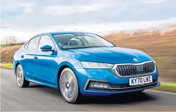  ??  ?? CHARGED UP: The Skoda Octavia hybrid can cover up to 43 miles on battery power.