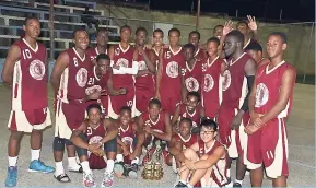  ?? PHOTO BY KAVARLY ARNOLD ?? Members of Herbert Morrison Technical High School’s Under-16 and Under-19 teams, which won the 2018 ISSA /Western Conference Basketball Championsh­ips on Friday, pose with their trophies at the MoBay Cricket Club....