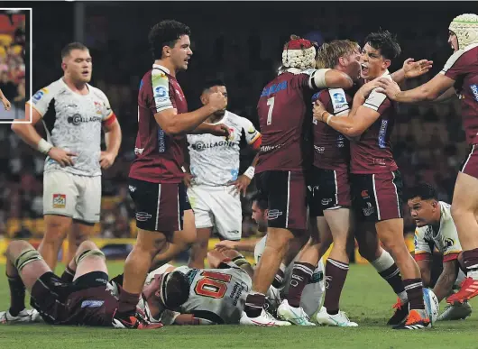  ?? GETTY IMAGES ?? The Reds celebrate their victory over the highly fancied Chiefs at Suncorp Stadium in Brisbane.