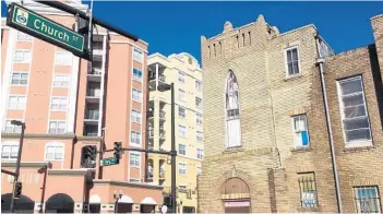  ?? JOY WALLACE DICKINSON PHOTOS ?? The former Ebenezer United Methodist Church, right, 596 W. Church St., was designated an Orlando Historic Landmark in 2004. The varying colors of brick reflect the sequence of constructi­on.