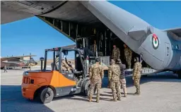  ?? ?? Loading up: Aid is loaded on to the C-130 heading to Gaza