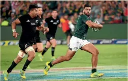  ?? GETTY IMAGES ?? Damian de Allende and the Springboks had the All Blacks on the run for much of the test, but New Zealand found a way to snatch a win.