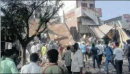 ?? Picture: EPA ?? ‘DEADLIEST’: People gather at the site of an explosion in Jhabua, Madhya Pradesh, India, where at least 88 people were killed after explosions ripped through a packed restaurant on Saturday. A further 150 were injured when the two-storey building...