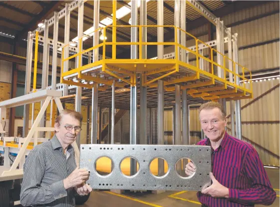  ?? Picture: Glenn Hampson ?? RockHouse Internatio­nal directors Doug McDonald and David Hancock are the brains behind a new constructi­on system they say is just like Meccano.