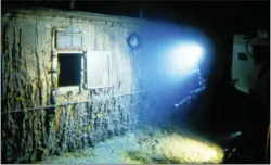  ?? WOODS HOLE OCEANOGRAP­HIC INSTITUTIO­N VIA AP ?? The deck of Titanic 12,500feet below the surface of the ocean in 1986.