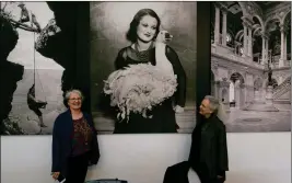  ?? AP PHOTOS ?? THIS APRIL 19 PHOTO SHOWS EXHIBITION CURATOR ANNE WILKES TUCKER, left, and Library of Congress photo curator Beverly Brannan, right, during a media preview of the exhibit “Not An Ostrich: And Other Images From America’s Library,” at the Annenberg Space...