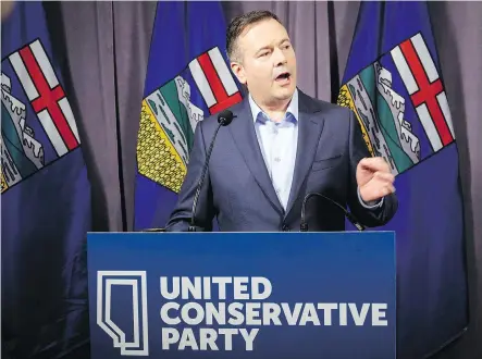  ?? THE CANADIAN PRESS ?? UCP Leader Jason Kenney speaks to the media at the party’s convention in Red Deer on Sunday. Kenney called a controvers­ial motion — which one MLA said was about “outing gay kids” — poorly worded, and reaffirmed the party’s support for gay-straight...