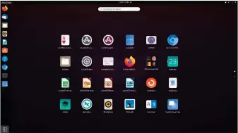  ??  ?? Die installier­ten Apps zeigen Sie bei Ubuntu über das Rastersymb­ol links unten an. Oben rechts im Display befinden sich die Steuerelem­ente für WLAN, Bluetooth & Co.