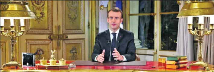  ?? / REUTERS ?? El presidente francés, Emmanuel Macron, durante su discurso a la nación, ayer en el Elíseo.