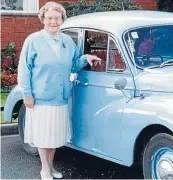  ??  ?? Evelyn Patrick with her beloved Morrie Minor, which had
51 consecutiv­e years on the road.