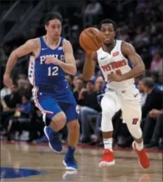  ?? CARLOS OSORIO — THE ASSOCIATED PRESS ?? Sixers guard T.J. McConnell, in a rare appearance this season against Ish Smith and the Pistons Oct. 23, has often been the odd man out of the Sixers’ backcourt as Brett Brown tries to get minutes for Markelle Fultz.