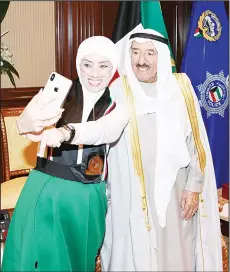  ??  ?? Shaima Yousef Al-Eidi with His Highness the Amir Sheikh Sabah Al-AhmadAl-Jaber Al-Sabah