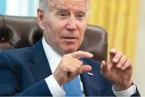  ?? AP Photo/Evan Vucci ?? ■ President Joe Biden speaks Thursday during an interview with the Associated Press in the Oval Office of the White House in Washington.
