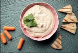  ?? The St. Louis Post-Dispatch/TNS/CRISTINA M. FLETES ?? White Bean and Roasted Garlic Dip