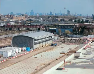  ?? HS2 ?? Looking south-east across HS2’s Willesden logistics hub towards Willesden Junction and the City in the background.