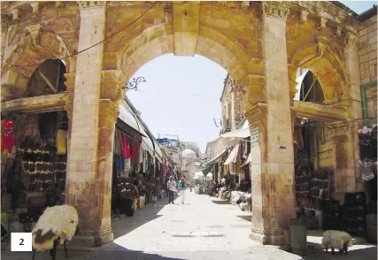  ?? (Felix Rubinstein) ?? 2. A TOWERING ARCH gracing the entrance to the Muristan Complex welcomes visitors in Jerusalem’s Old City. 2