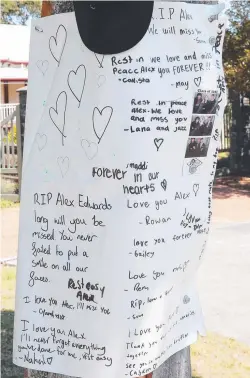  ?? ?? Tributes at the crash scene where 18-year-old Alex Edwards was killed on Somerset Dr, Mudgeeraba. Picture: Glenn Hampson