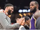  ?? DERICK E. HINGLE/USA TODAY SPORTS ?? Lakers forwards Anthony Davis, left, and Lebron James celebrate during a game against the Pelicans on Sunday.